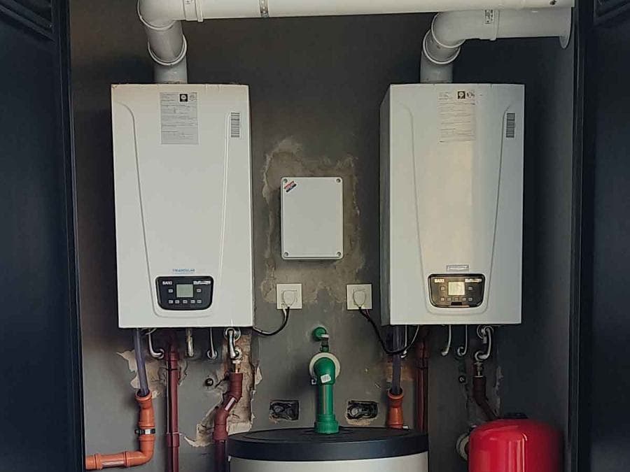 Calefacción completa para una casa grande, con dos calderas